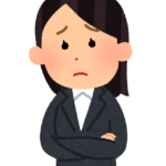 悩む人